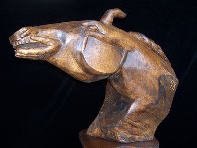 Libertà condizionata, legno, 63×80×45 cm